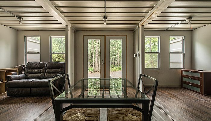 Gorgeous Solar Powered Off Grid Shipping Container Cabin For $58k